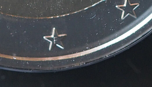 Detail; 'F' in de ster